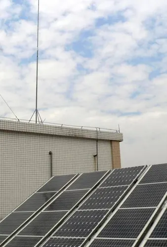 Solar technician testing panels